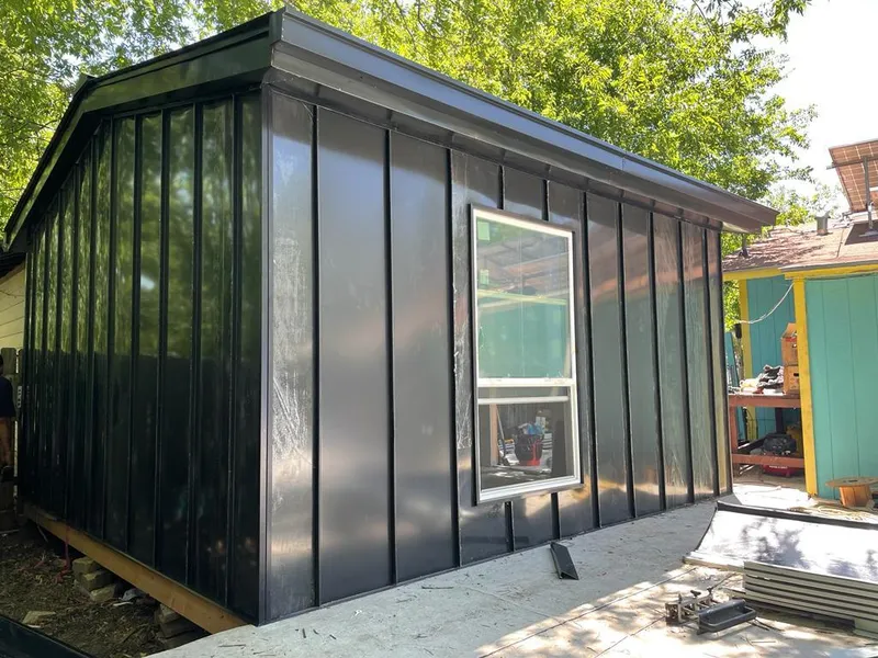 Black standing seam metal wall panels for Metal Roof Installation in Forest Lake