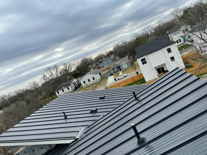 Standing seam metal roof panels with vents for Skylight Repair in Forest Lake